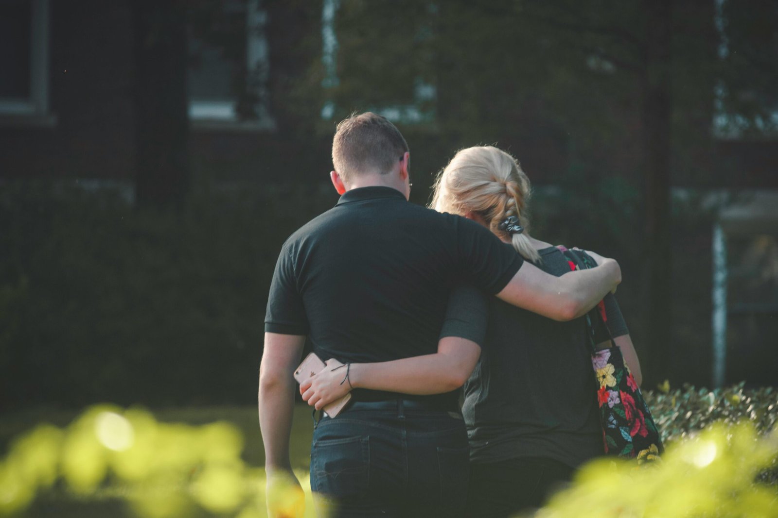 Couple Walking Toward Building