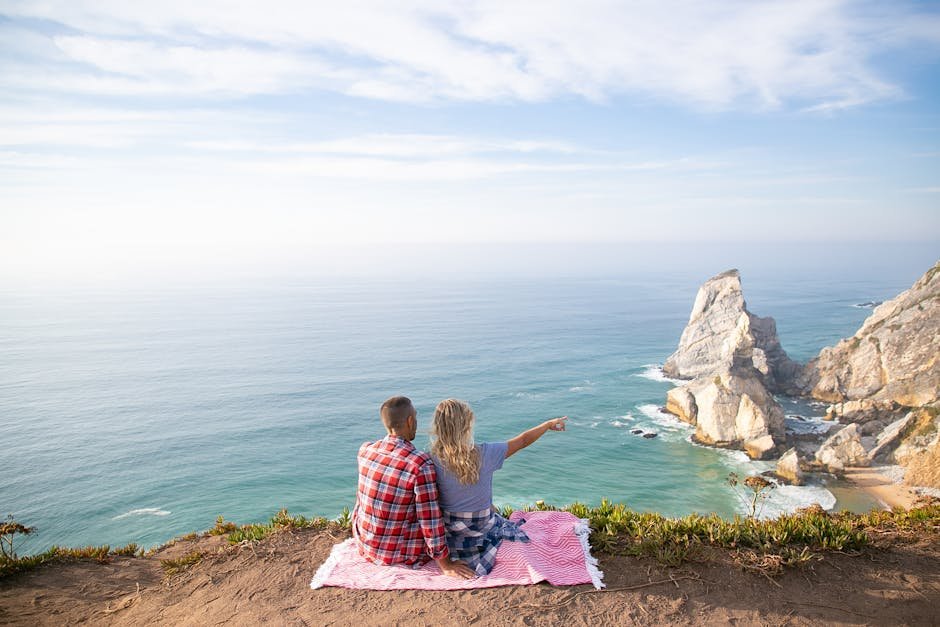 picnic romantico de valentine's day a beira do mar e costas montanhosas