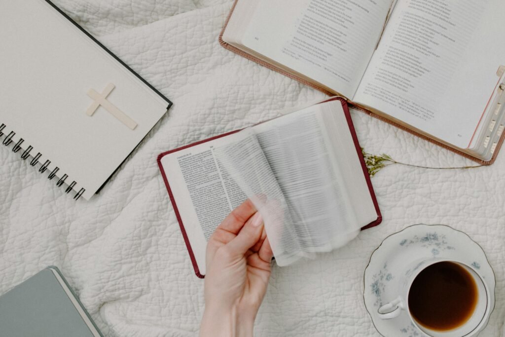 A cozy setup of Bible reading with a cup of coffee, evoking a peaceful morning routine.