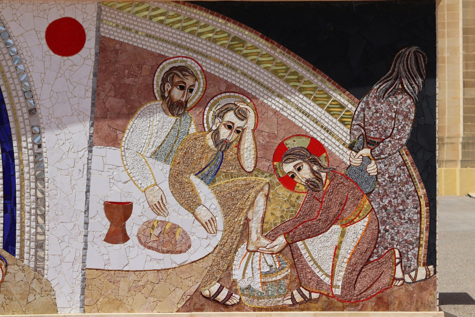 Vibrant mosaic illustrating a biblical scene with disciples at a table outdoors.