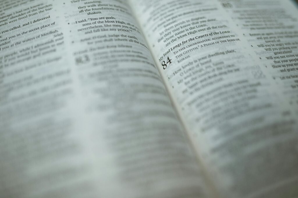 A detailed close-up of a Bible page with a highlighted Psalm, symbolizing faith and spirituality.